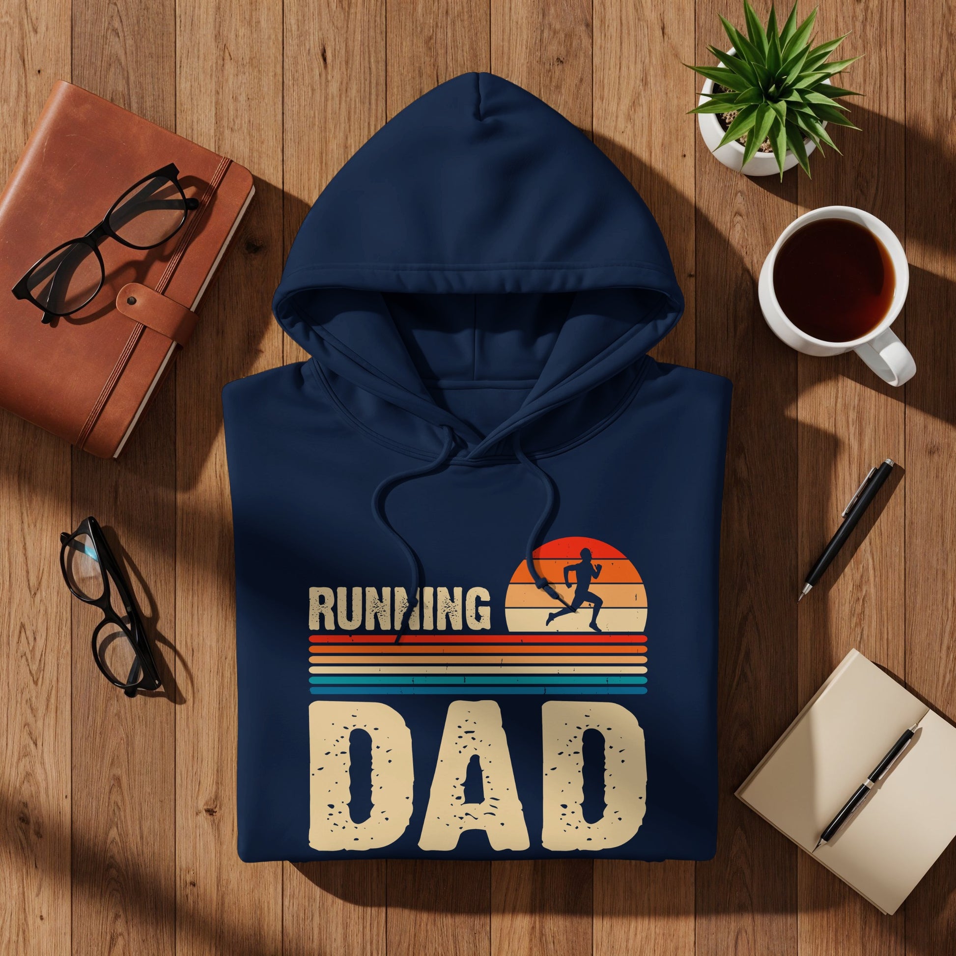 Navy hoodie with "Running Dad" text and sunset graphic.