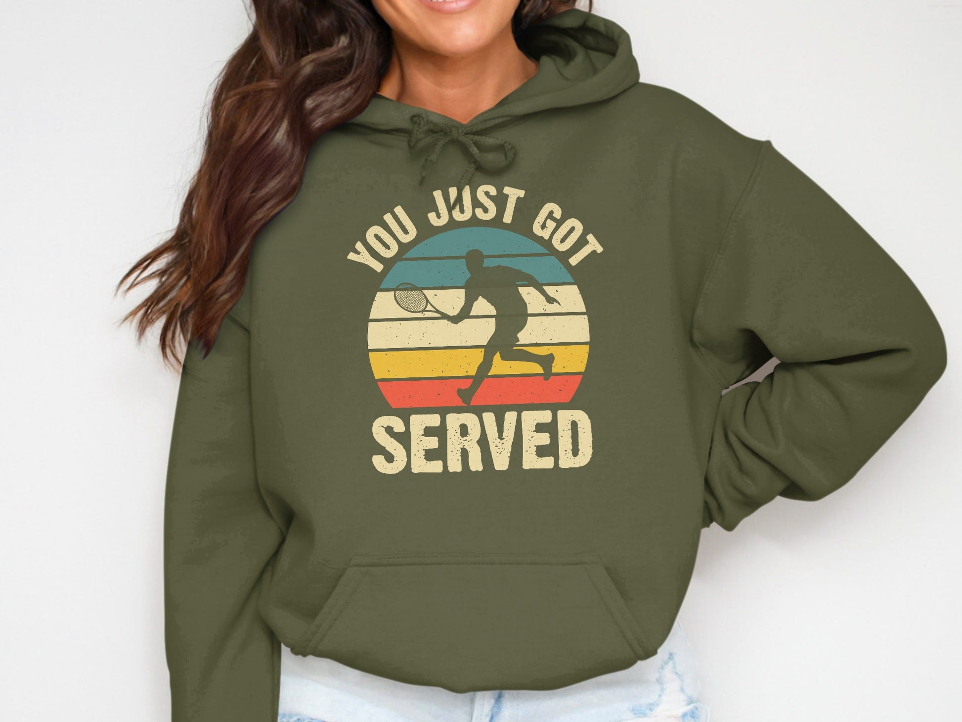 Olive green hoodie with vintage tennis graphic and text "YOU JUST GOT SERVED".