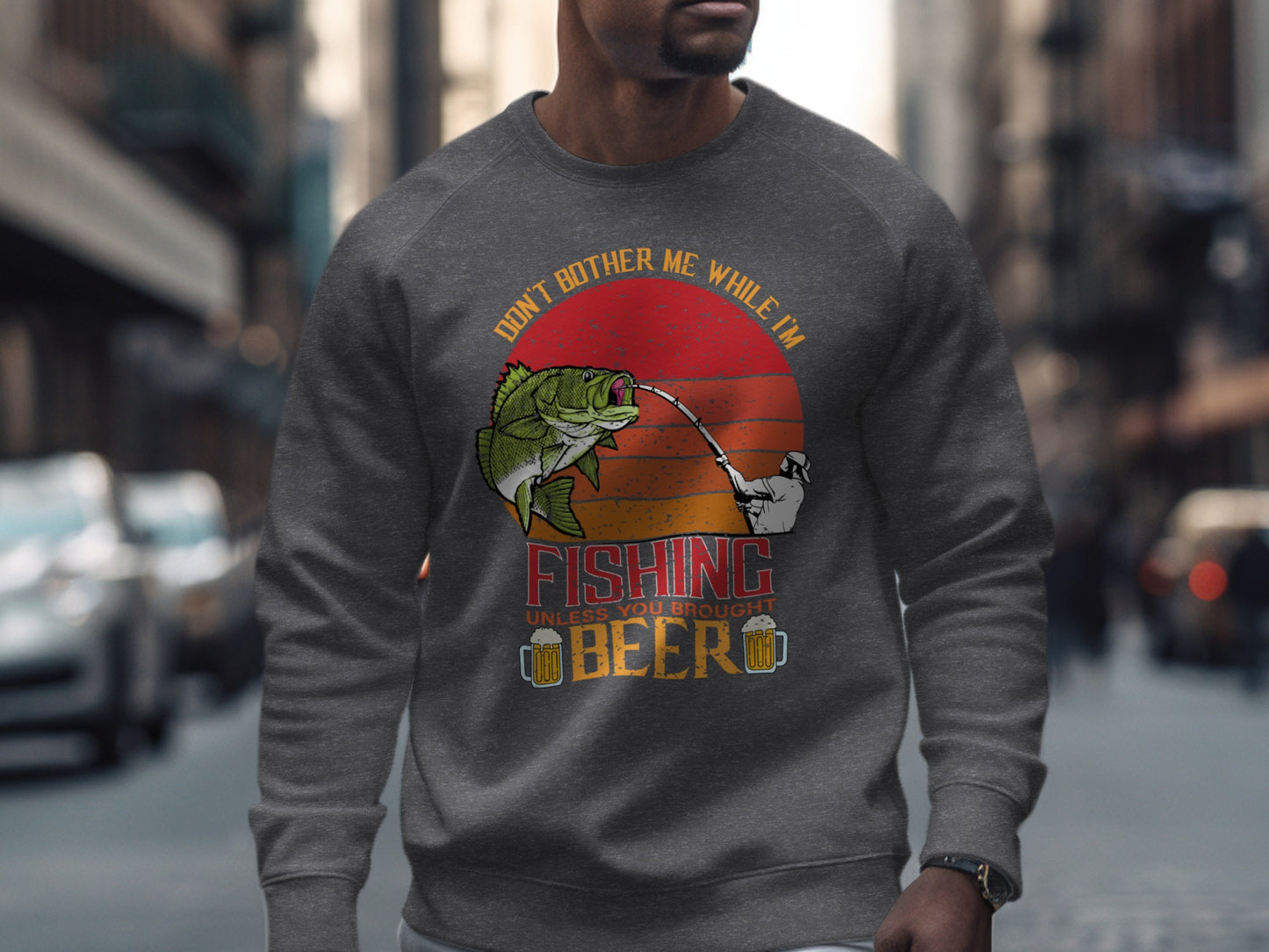 Dark gray sweatshirt with fishing and beer graphic and text.