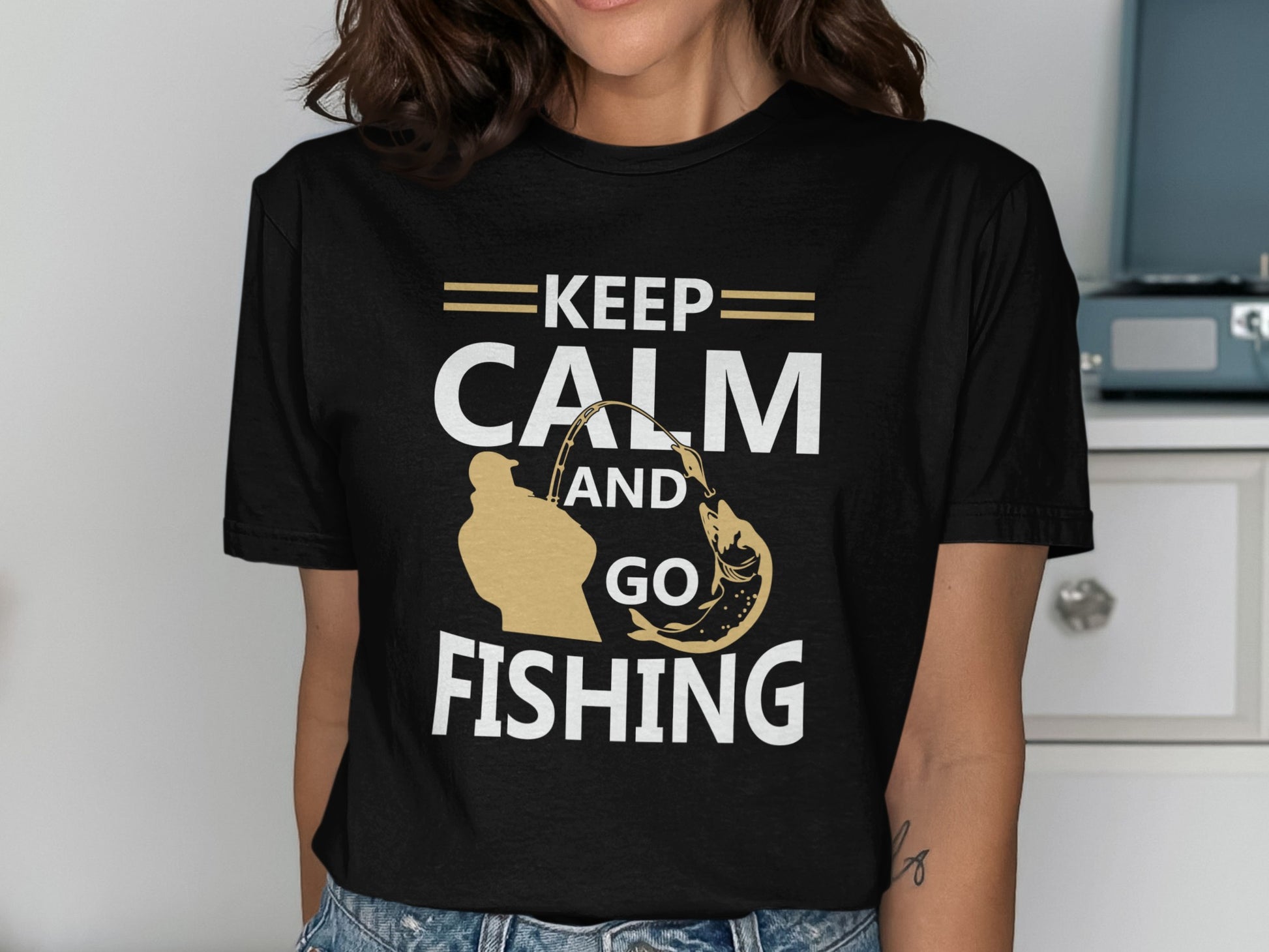 Black t-shirt with "Keep Calm and Go Fishing" text and fishing graphic.