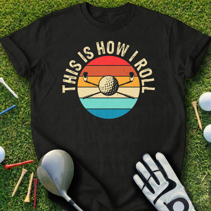 T-shirt with "This is How I Roll" text and golf clubs over a golf ball.