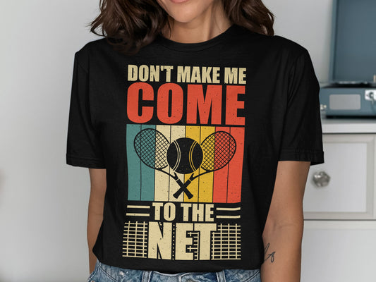 T-shirt with "Don't Make Me Come To The Net" and tennis rackets.