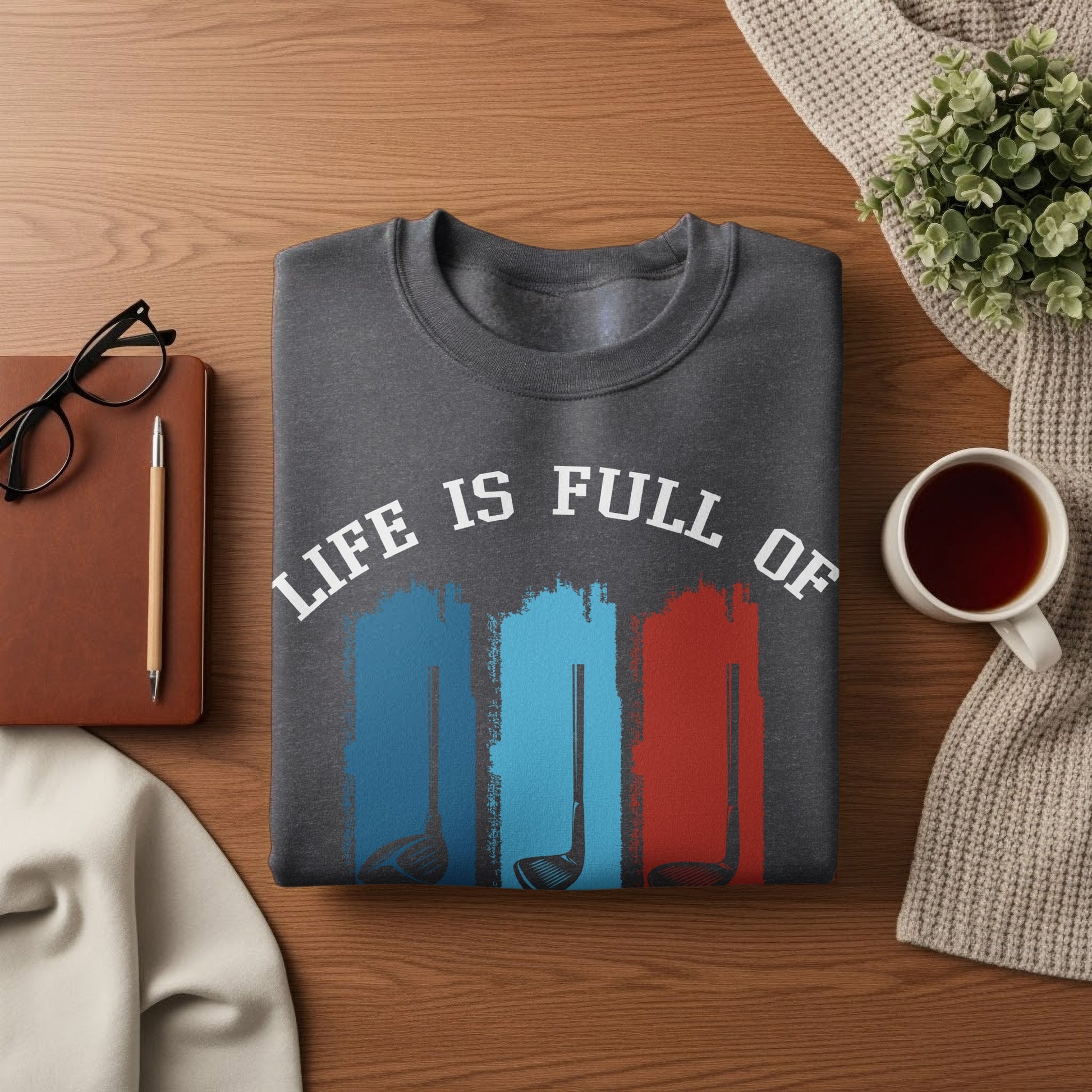 Dark gray sweatshirt with "LIFE IS FULL OF" text and golf club graphics.