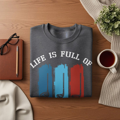 Dark gray sweatshirt with "LIFE IS FULL OF" text and golf club graphics.