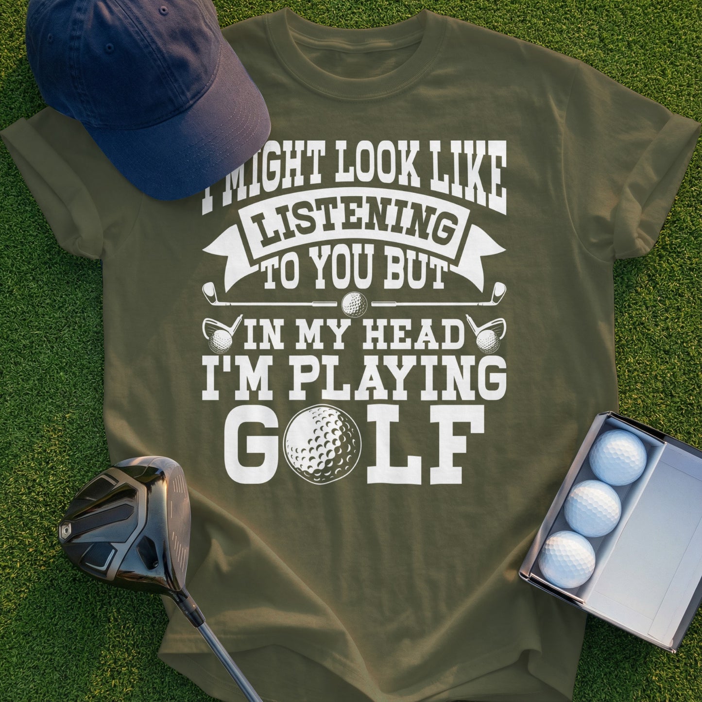 Olive green t-shirt with white text about listening and playing golf.