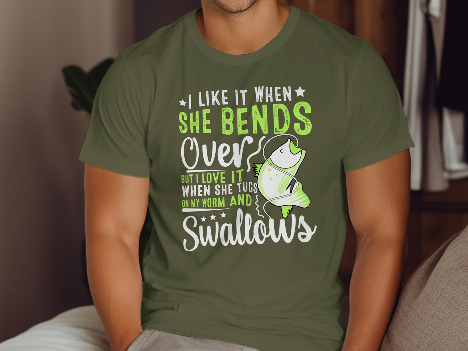 Green t-shirt with white text about fishing and a cartoon fish.