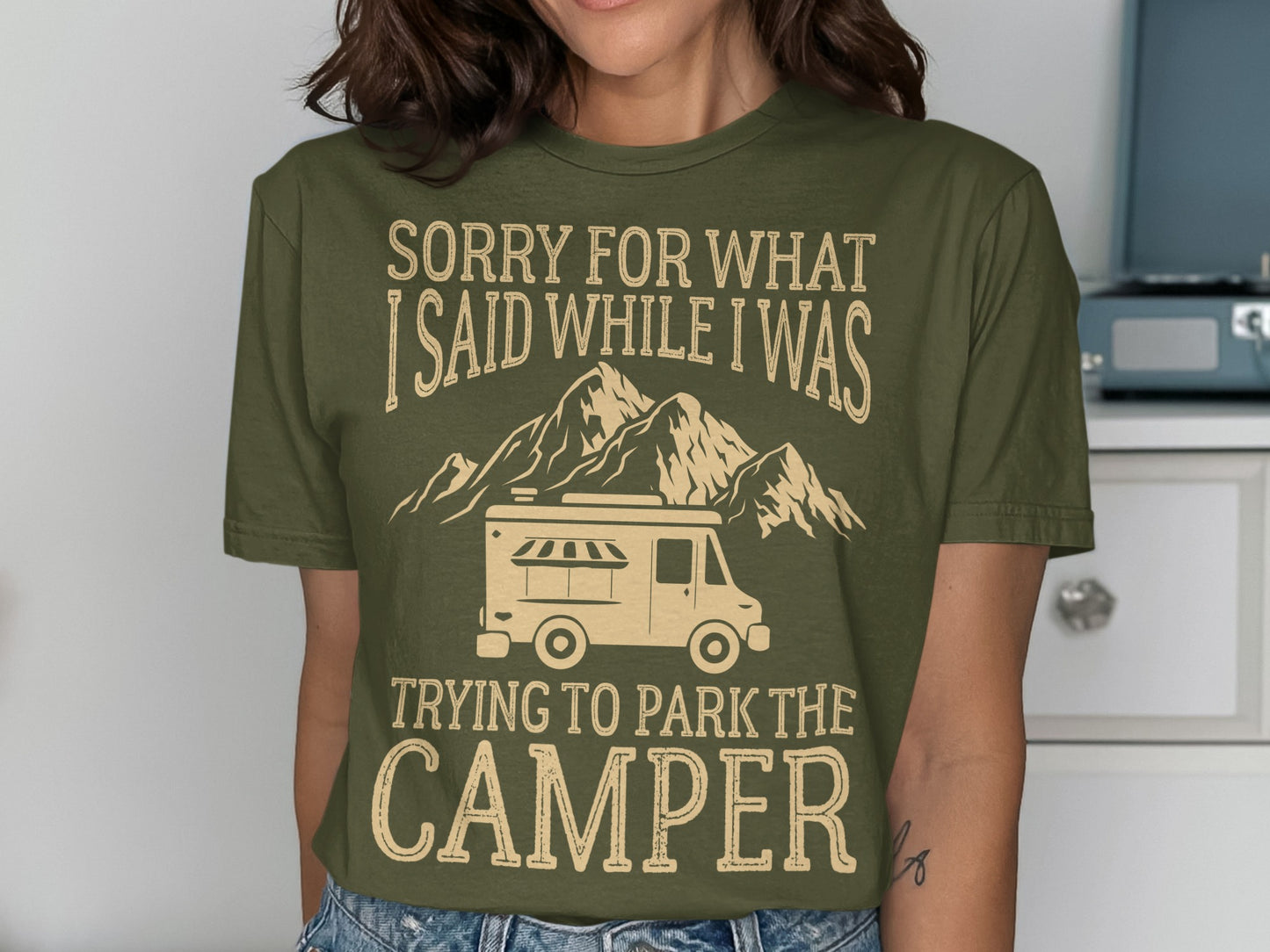 T-shirt with camper, mountains, and text "Sorry for what I said while trying to park the camper".