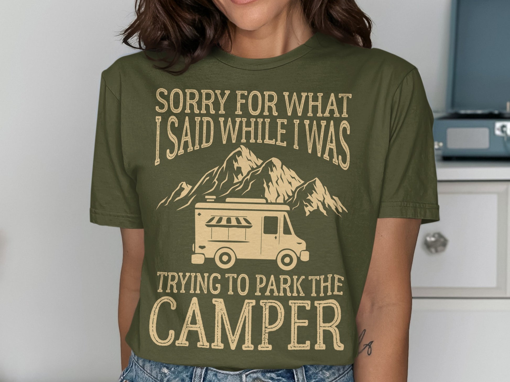 T-shirt with camper, mountains, and text "Sorry for what I said while trying to park the camper".