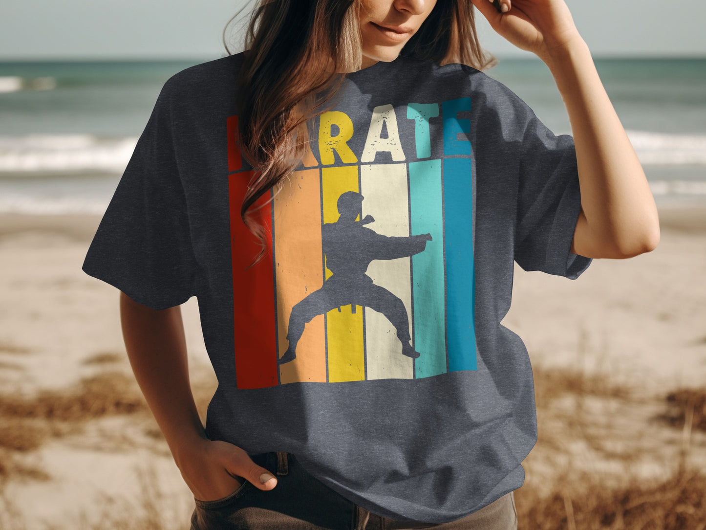 Karate graphic on a dark t-shirt featuring a martial artist silhouette against a striped background.