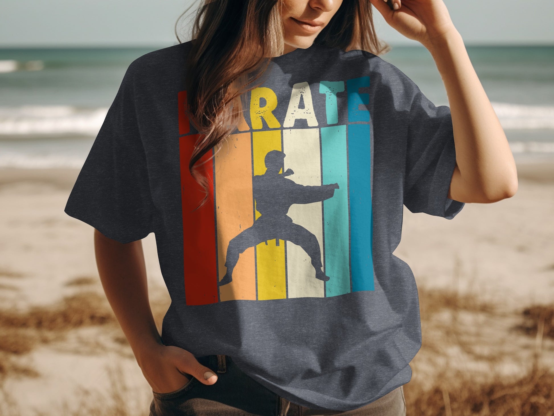 Karate graphic on a dark t-shirt featuring a martial artist silhouette against a striped background.