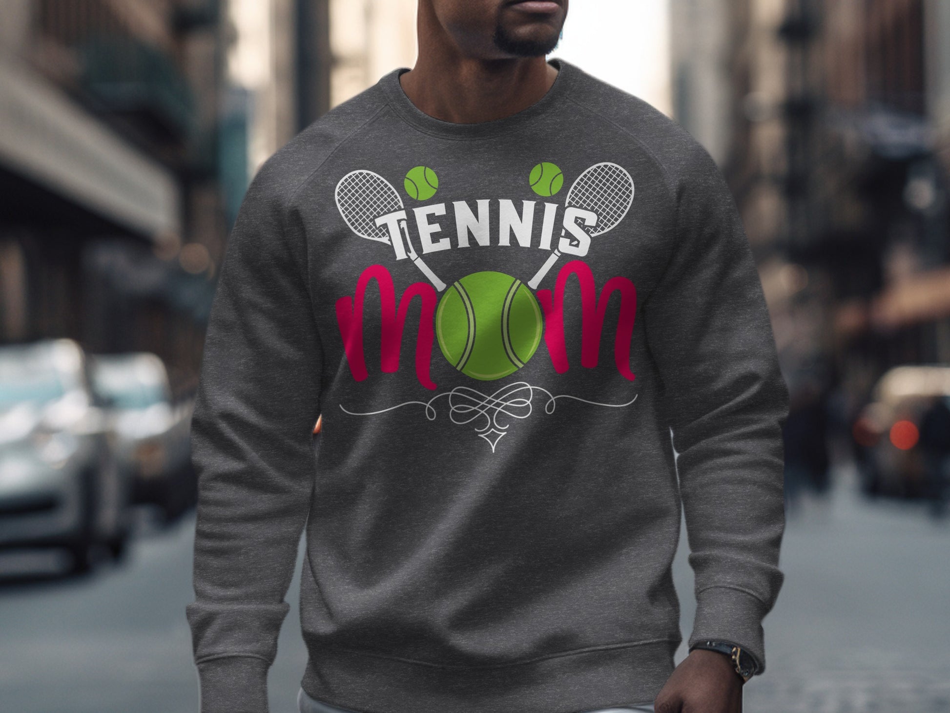 Gray sweatshirt with "TENNIS MOM" text, tennis rackets, and balls.