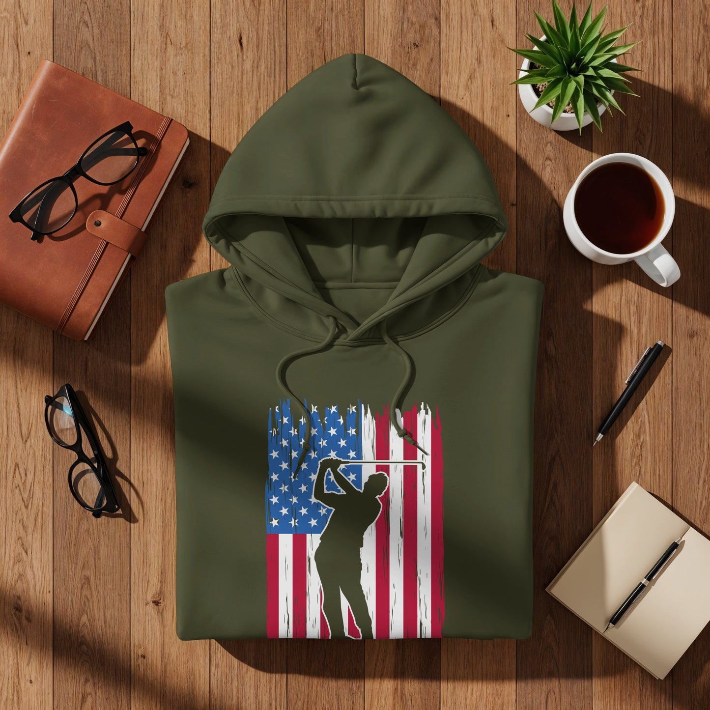 Green hoodie with distressed US flag graphic and golfer silhouette.