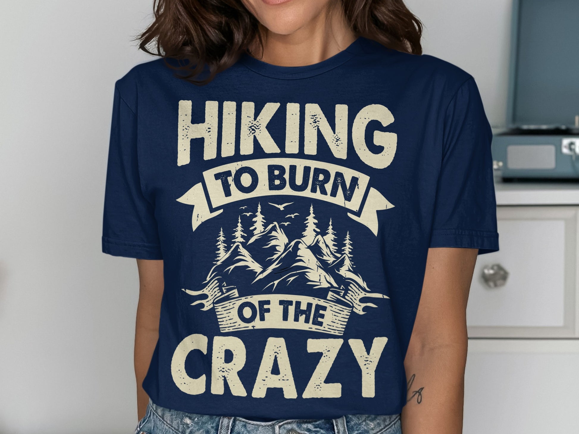 Navy t-shirt with "Hiking to Burn of the Crazy" text and mountain graphic.