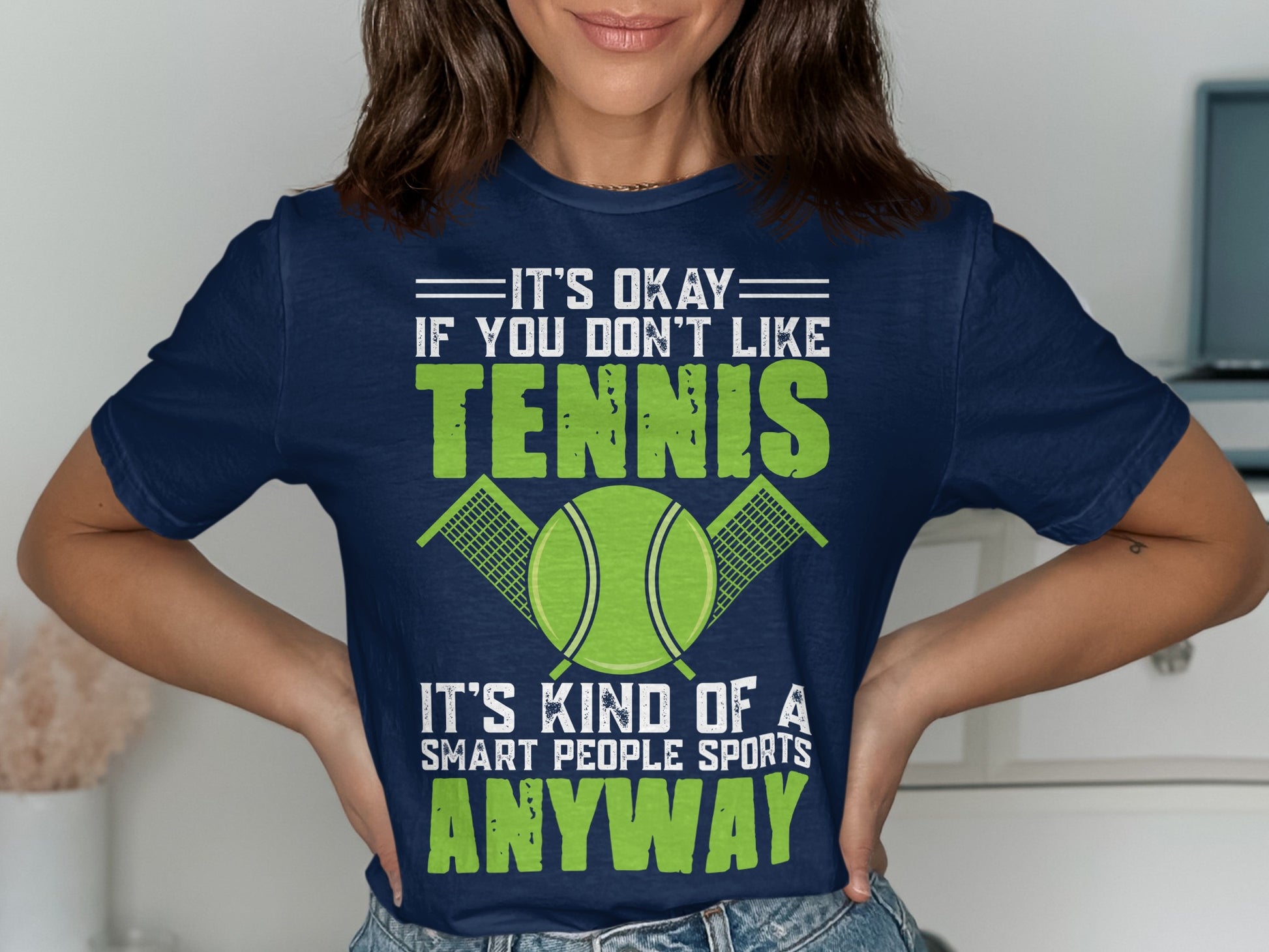 Navy t-shirt with text and tennis graphic: "It's okay if you don't like tennis...smart people sports anyway."