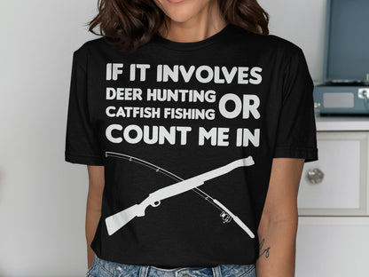 Black t-shirt with white text "IF IT INVOLVES DEER HUNTING CATFISH FISHING OR COUNT ME IN" and graphics.