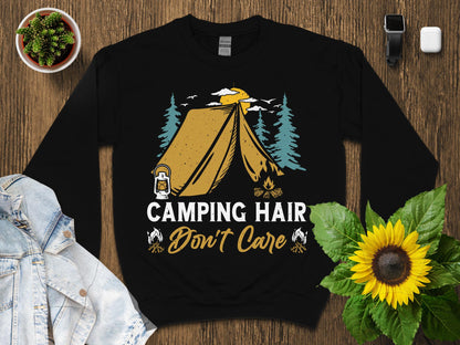 Black sweatshirt with "Camping Hair Don't Care" text and tent illustration.