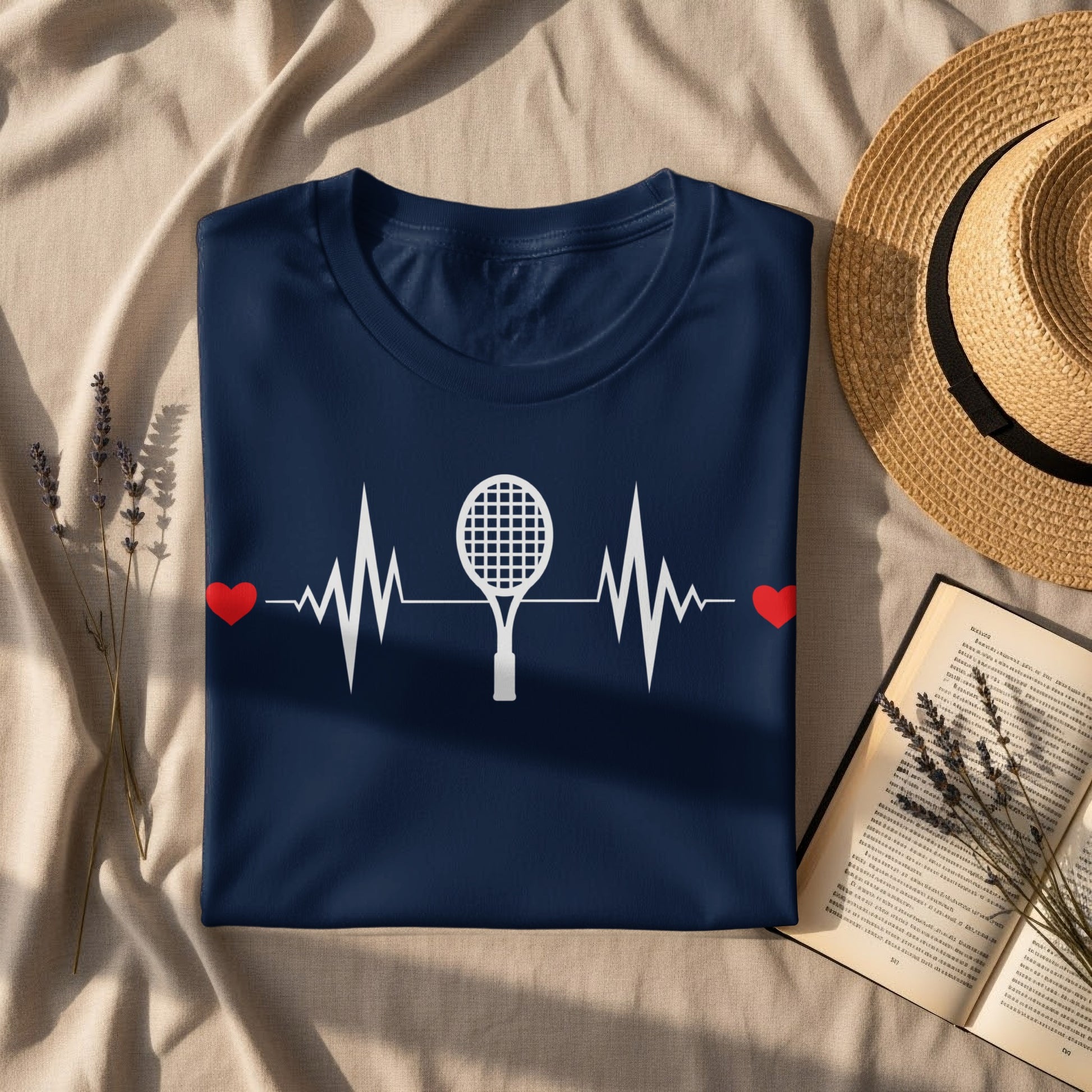 Navy t-shirt with white tennis racket heart rate graphic.