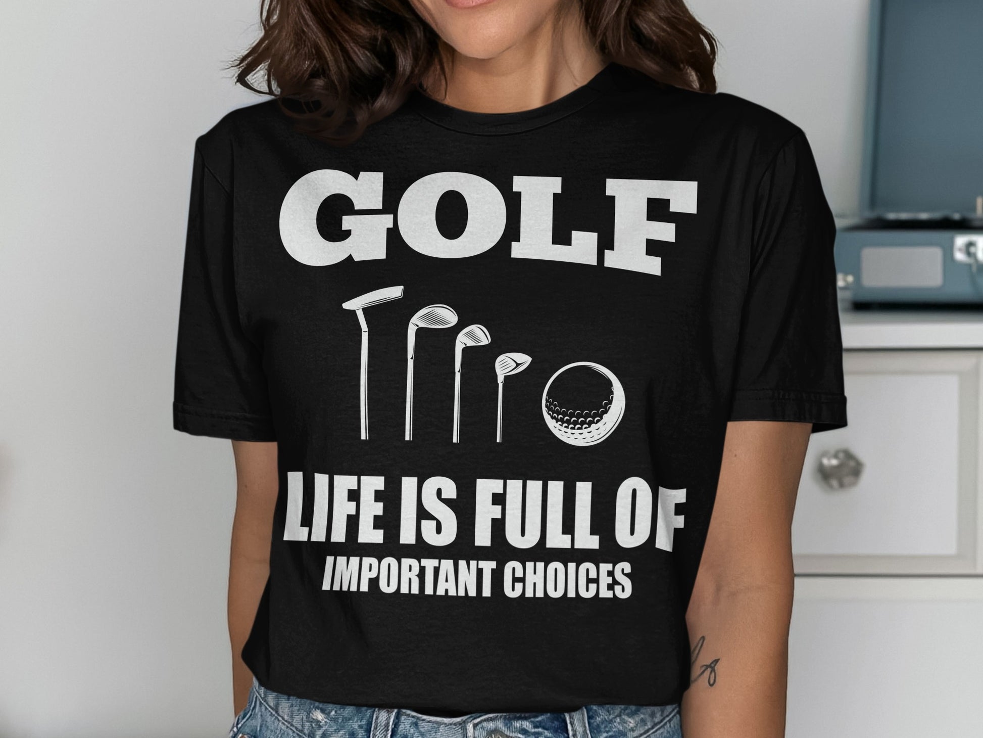 T-shirt with golf clubs, ball, and text: "GOLF LIFE IS FULL OF IMPORTANT CHOICES."