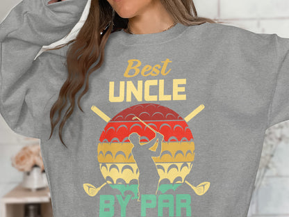 Grey sweatshirt with "Best Uncle By Par" text and golf imagery.