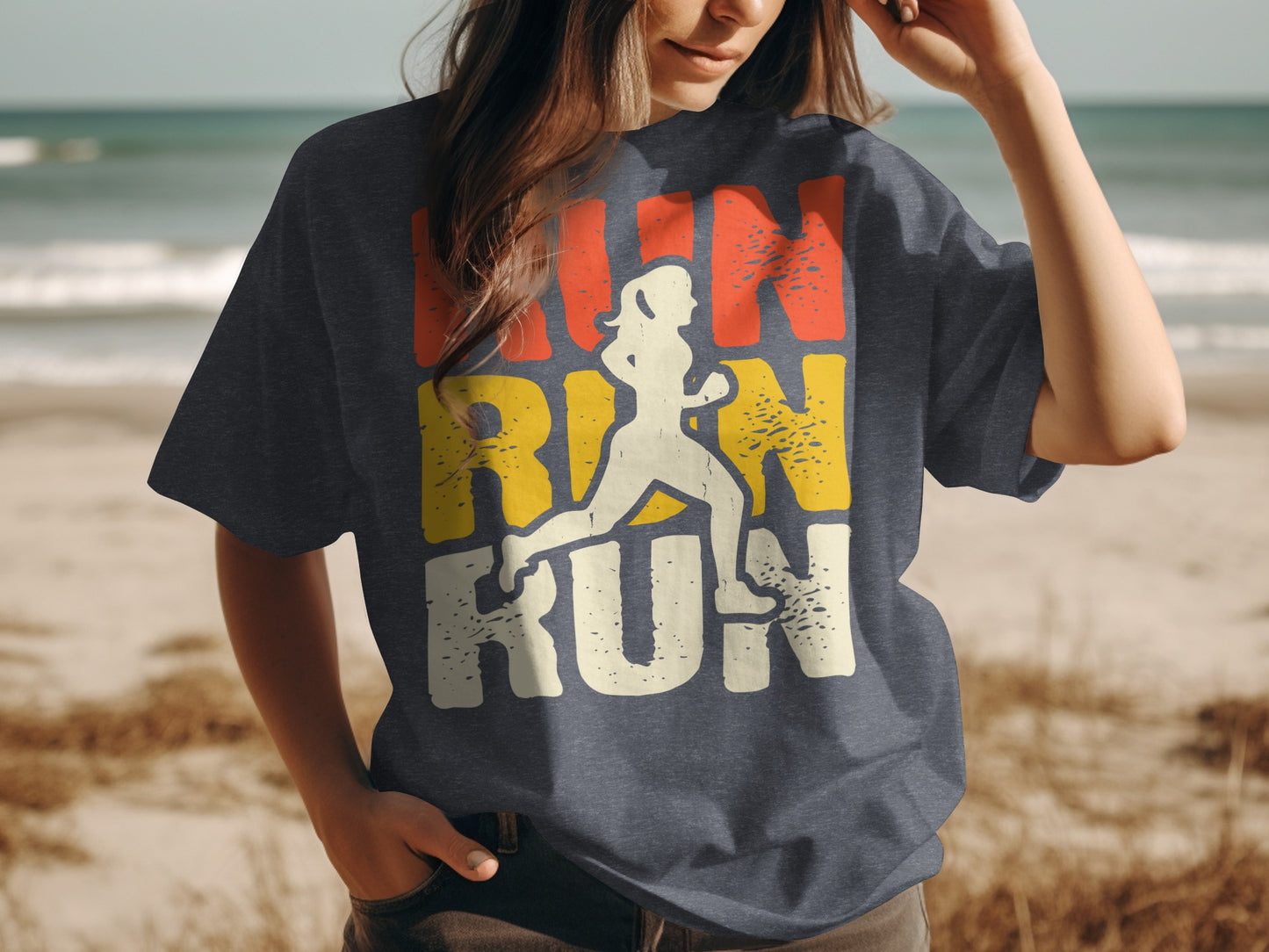 Graphic t-shirt with runner silhouette and "RUN RUN RUN" text on a beach background.