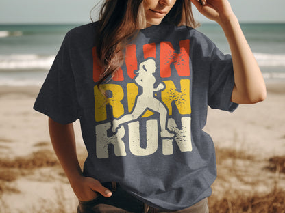 Graphic t-shirt with runner silhouette and "RUN RUN RUN" text on a beach background.