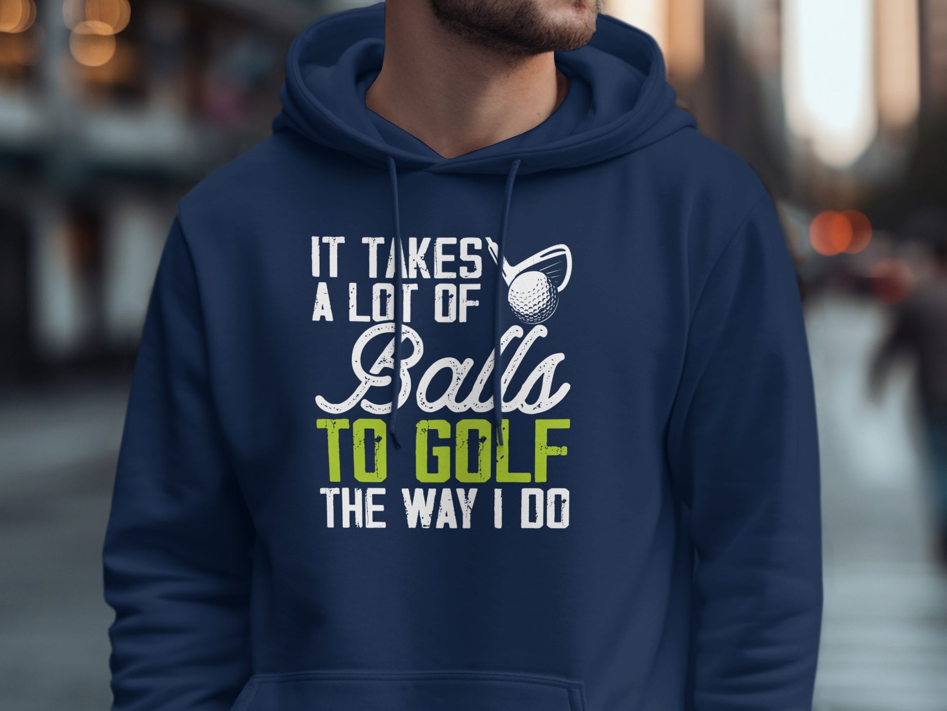Navy hoodie with "It Takes a Lot of Balls to Golf the Way I Do" text.