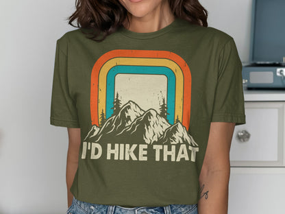 Olive green t-shirt with "I'd Hike That" and mountain landscape graphic.