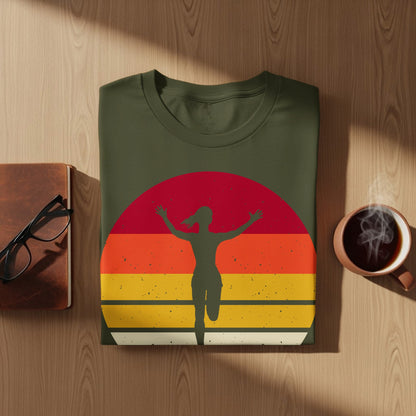 Olive green t-shirt with a sunset graphic and a running figure.