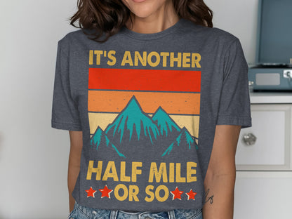Dark grey t-shirt with retro mountain graphic and text "It's Another Half Mile or So".