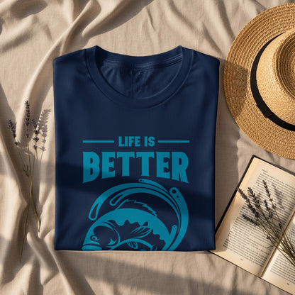 Navy t-shirt with "Life is Better" text and fish graphic.