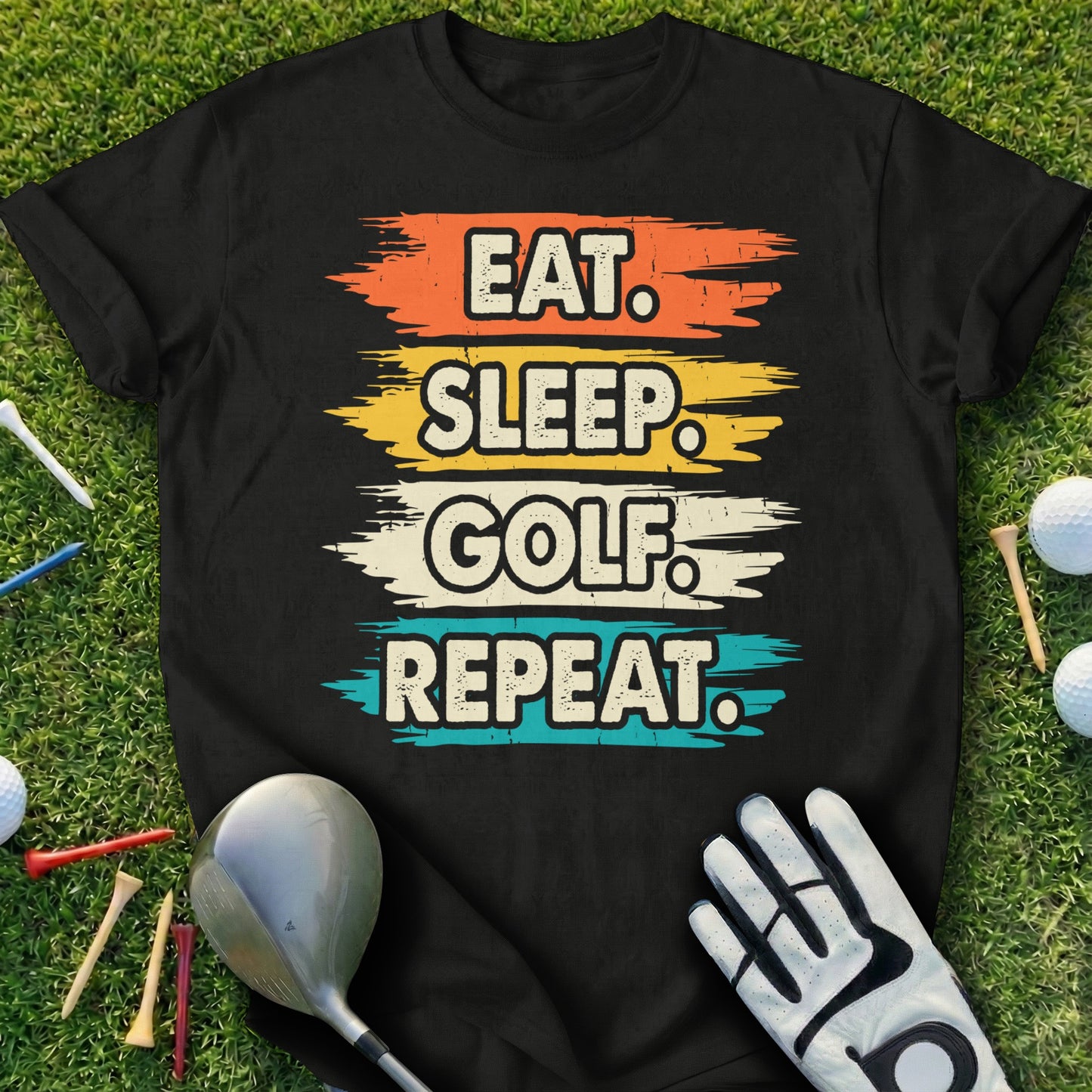Black t-shirt with "Eat. Sleep. Golf. Repeat." text in colorful stripes.