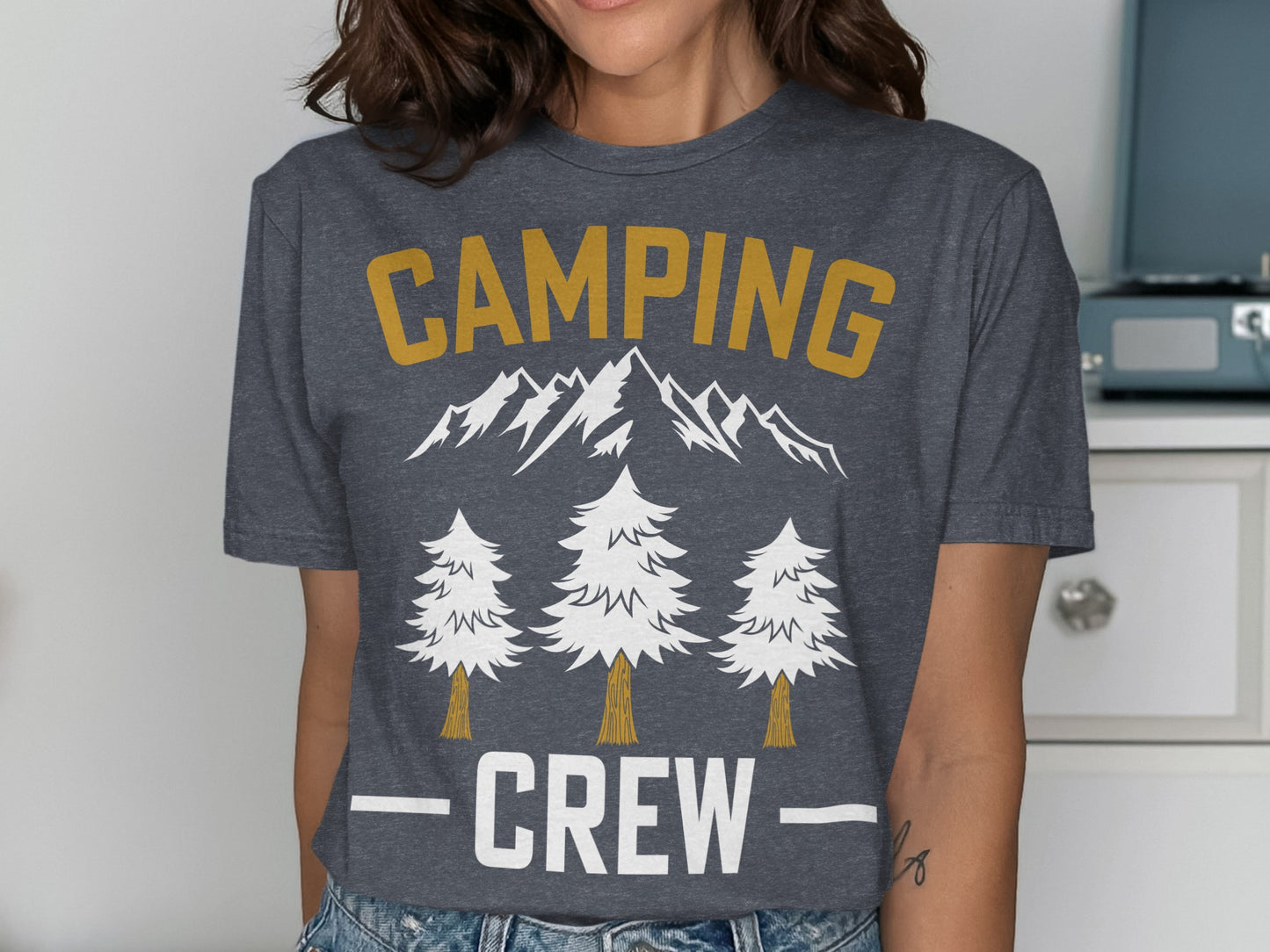 Dark grey t-shirt with "CAMPING CREW" text and mountain and tree graphic.