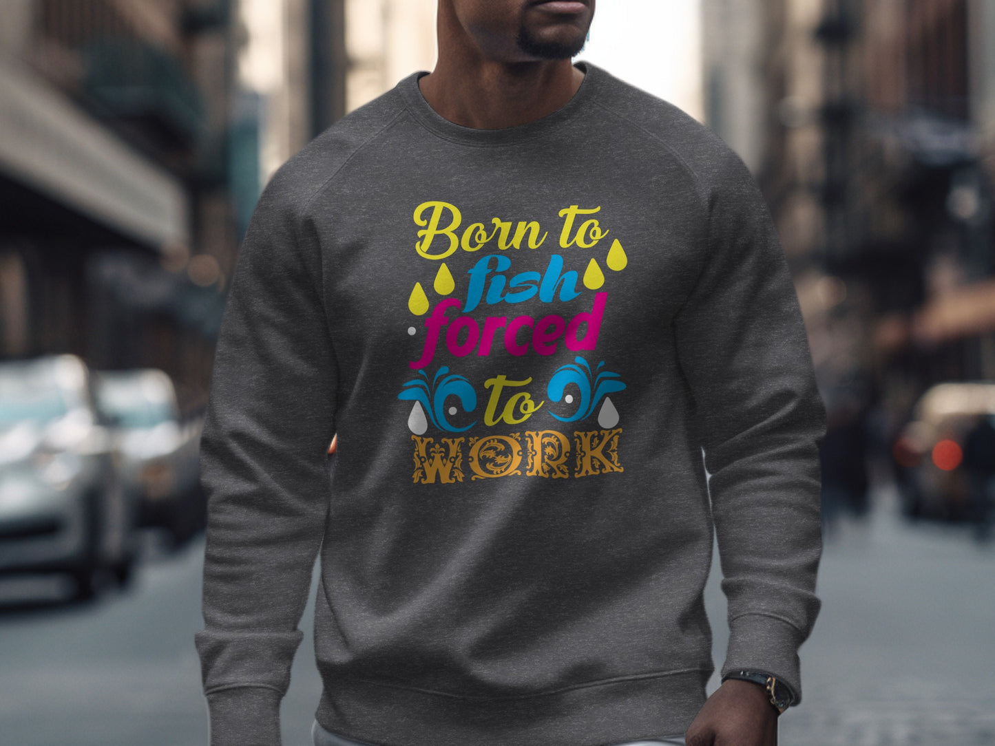 Gray sweatshirt with "Born to Fish Forced to Work" text and colorful graphics.
