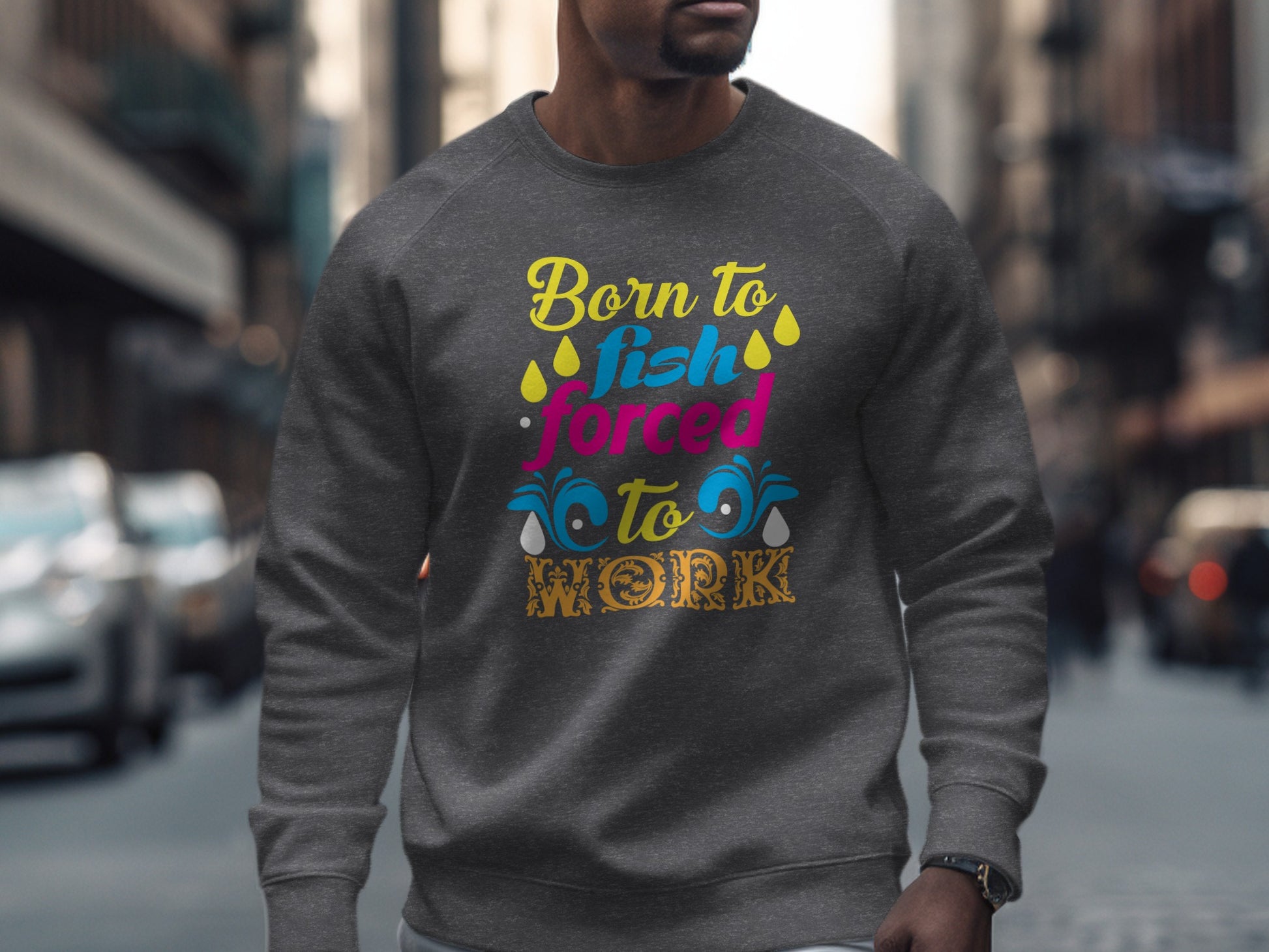 Gray sweatshirt with "Born to Fish Forced to Work" text and colorful graphics.