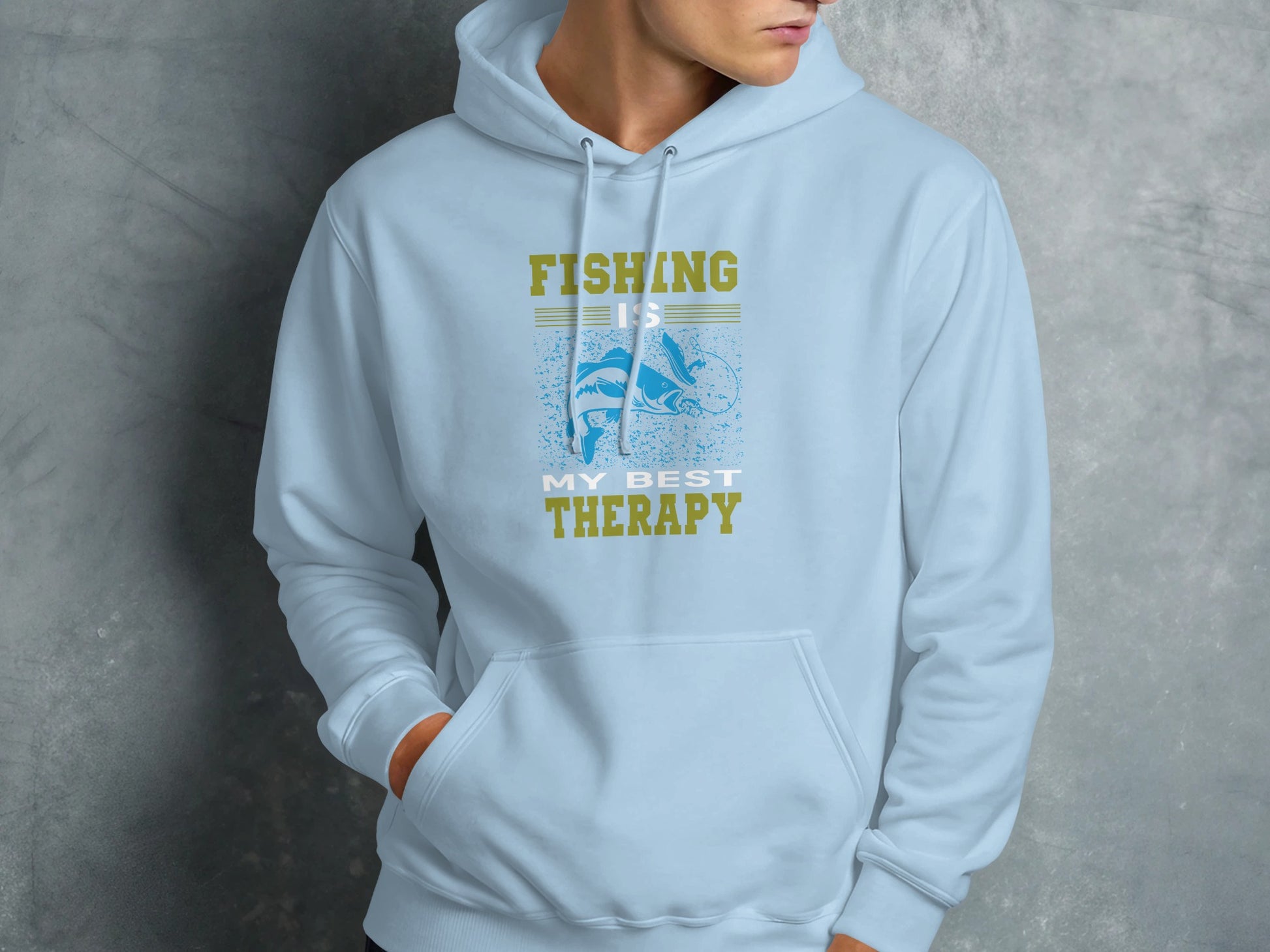Light blue hoodie with "FISHING IS MY BEST THERAPY" text and fish graphic.