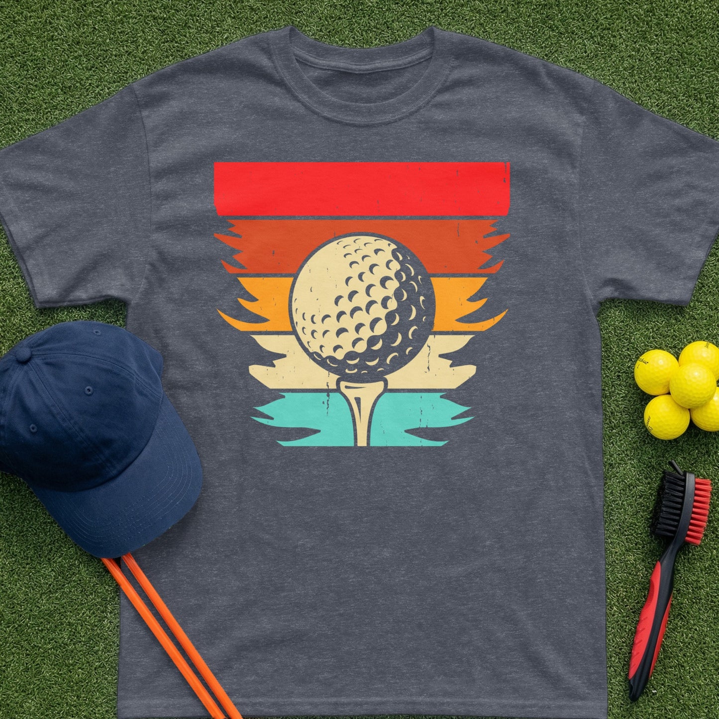 Dark grey t-shirt with a retro golf ball on a tee graphic.